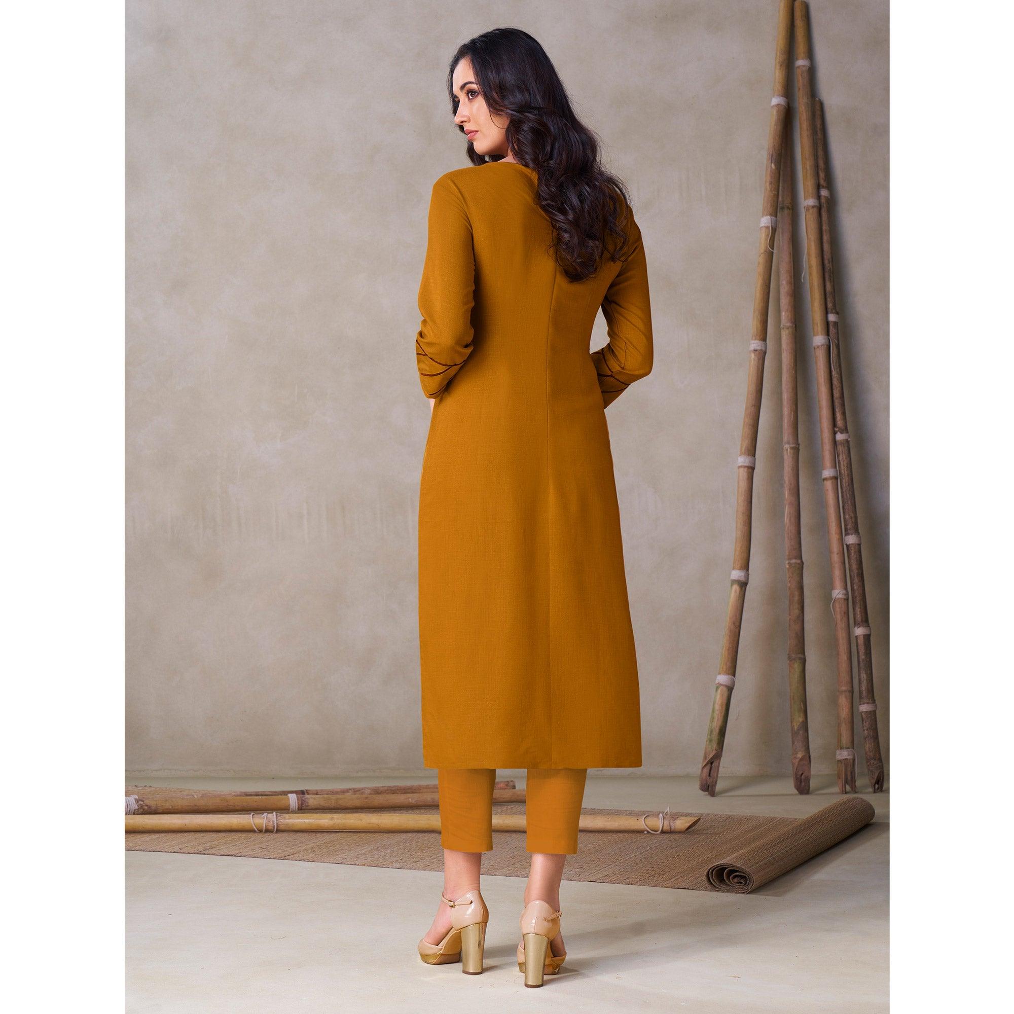 Gorgeous Mustard Yellow Colored Partywear Embroidered Viscose Kurti - Peachmode