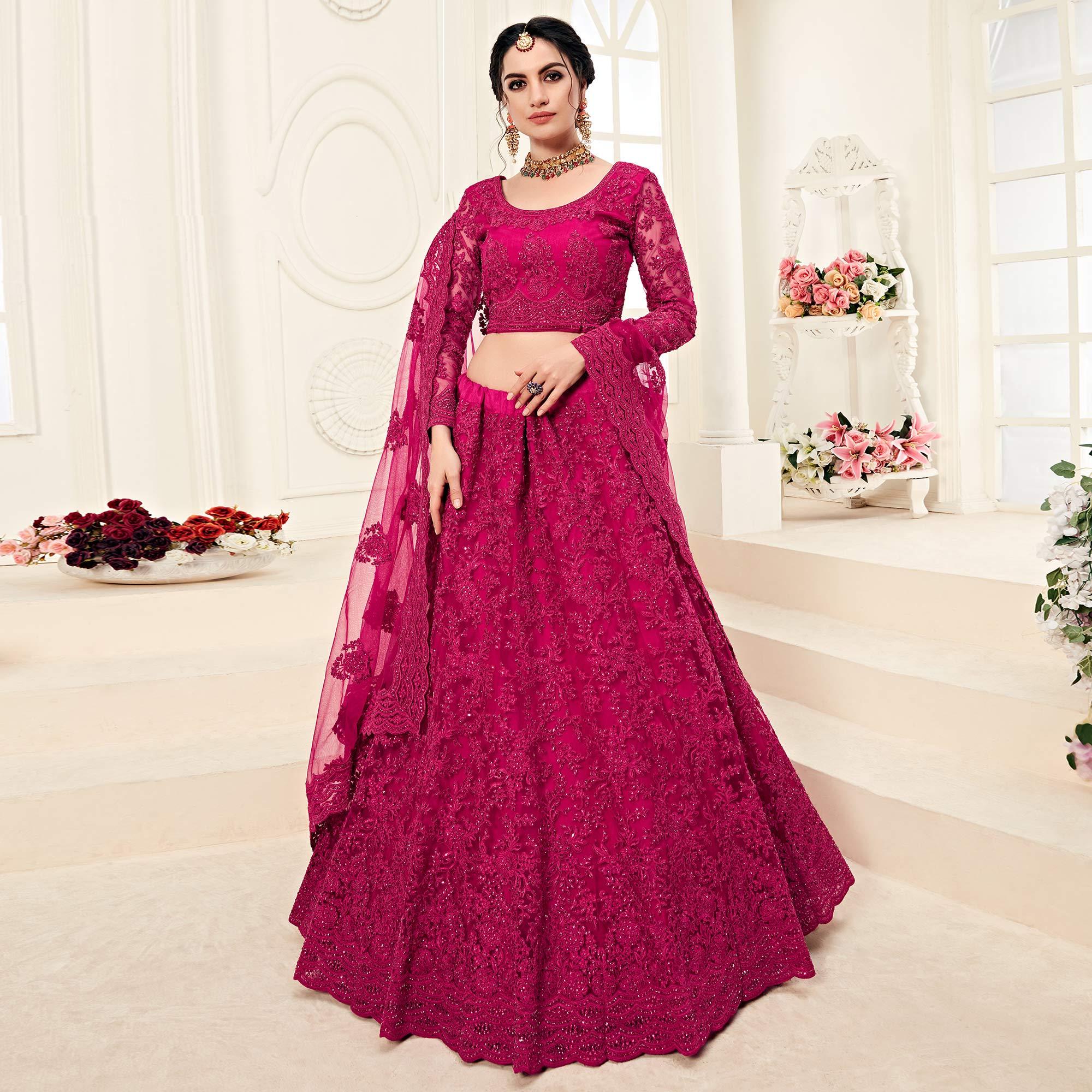 Gorgeous Rani Pink Colored Cording Embroidery Wedding Wear Net Lehenga Choli - Peachmode