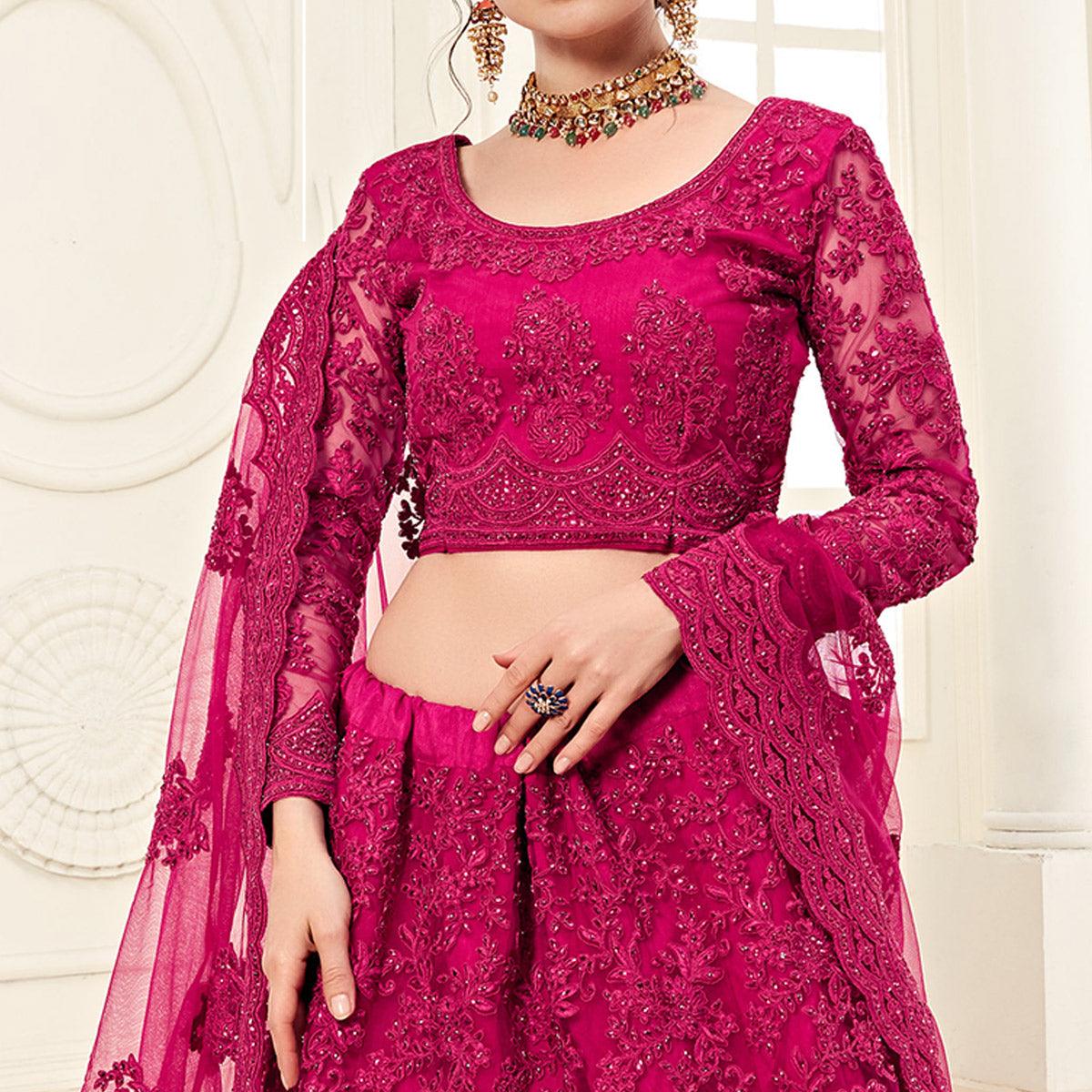 Gorgeous Rani Pink Colored Cording Embroidery Wedding Wear Net Lehenga Choli - Peachmode