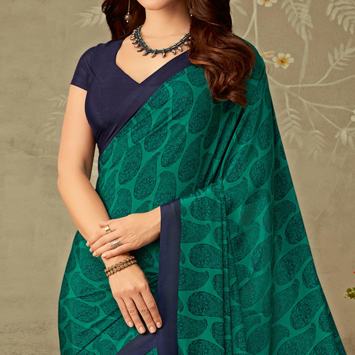 Gorgeous Turquoise Green Colored Partywear Printed Crepe Saree - Peachmode