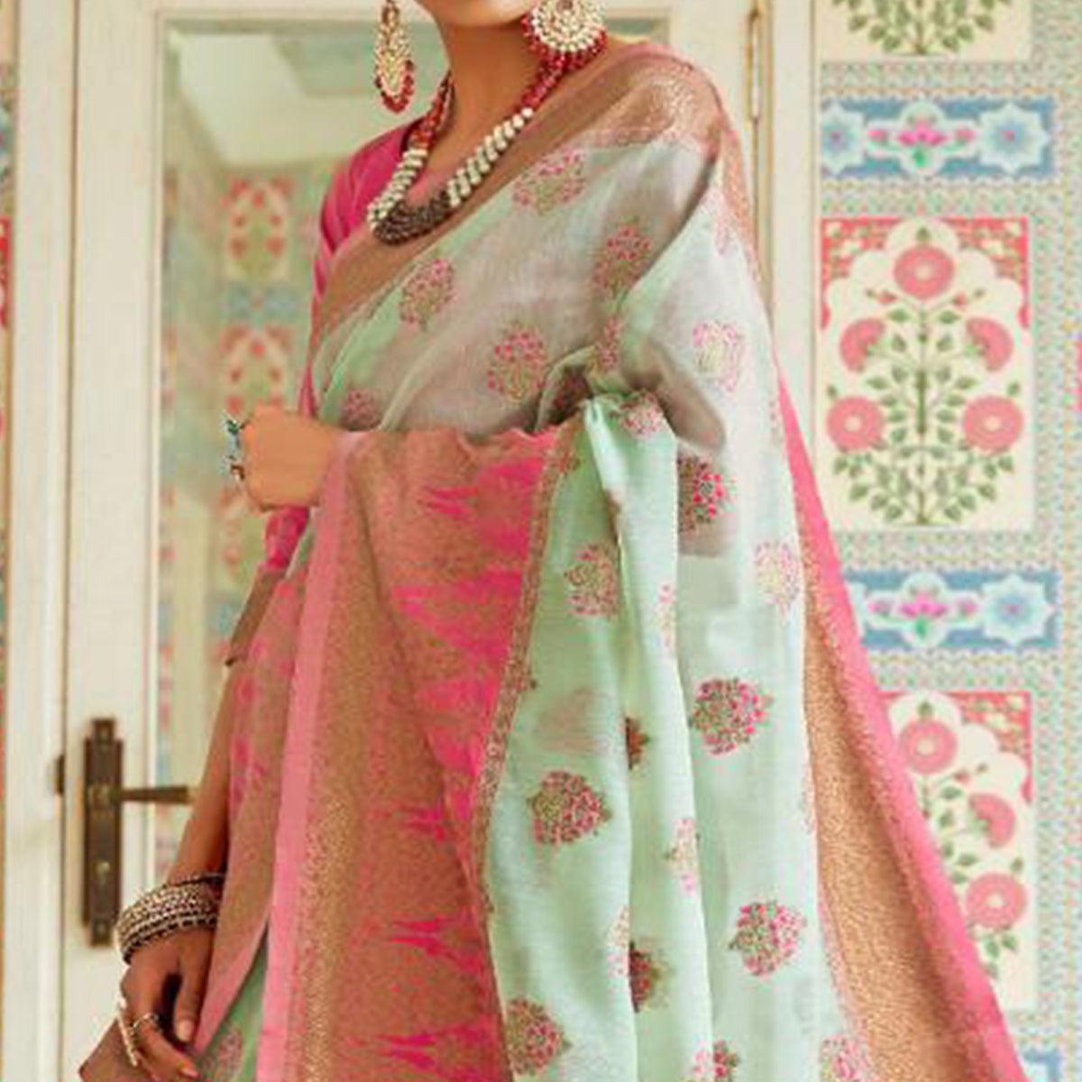 Graceful Aqua Green Colored Festive Wear Woven Linen Saree - Peachmode