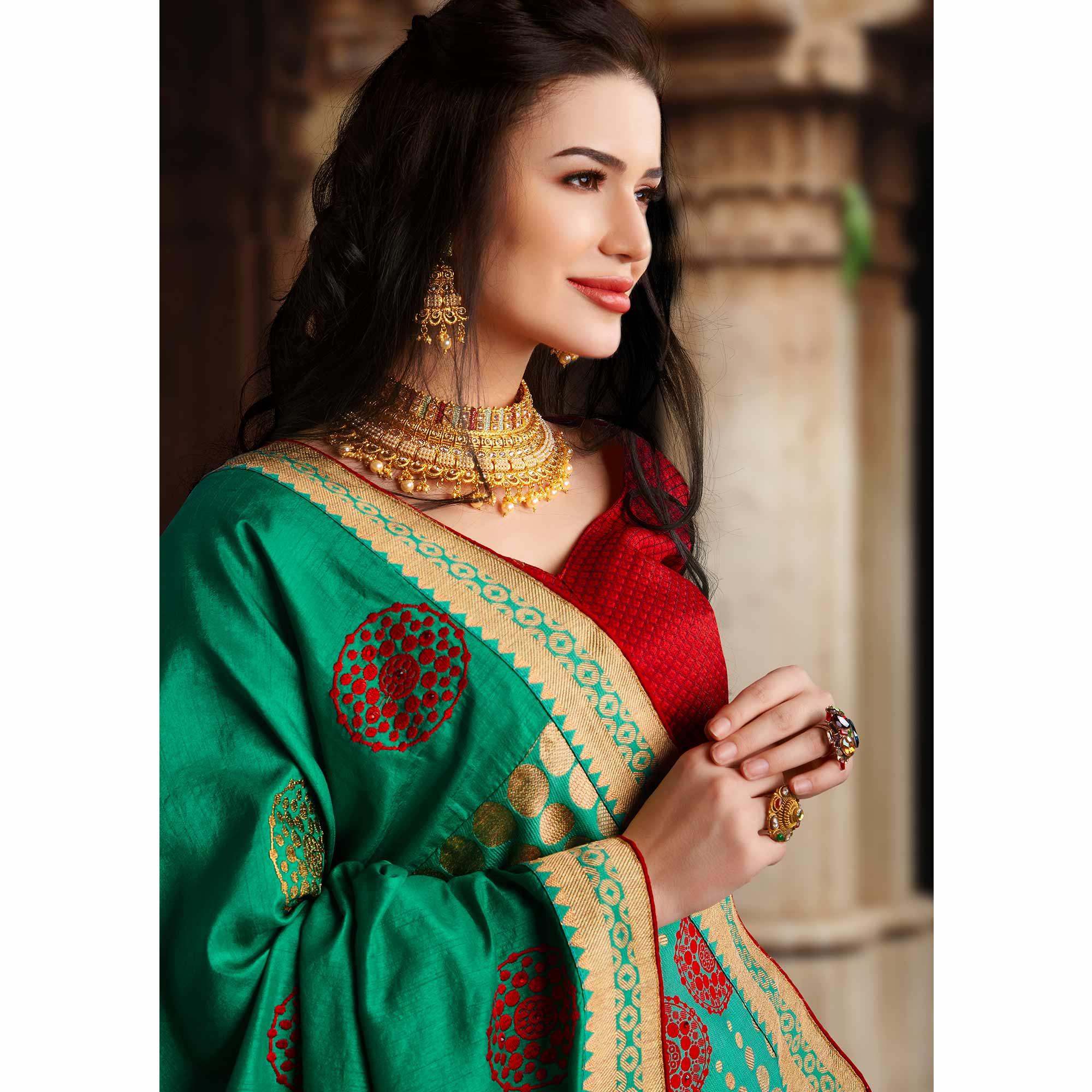 Graceful Aqua Green Colored Partywear Embroidered Silk Saree - Peachmode