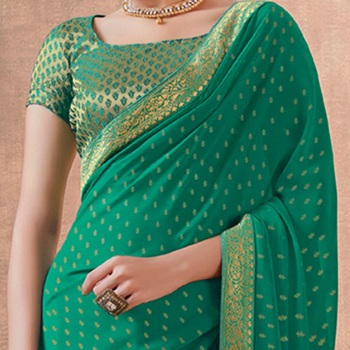Graceful Green Colored Festive Wear Foil Printed Georgette Saree - Peachmode