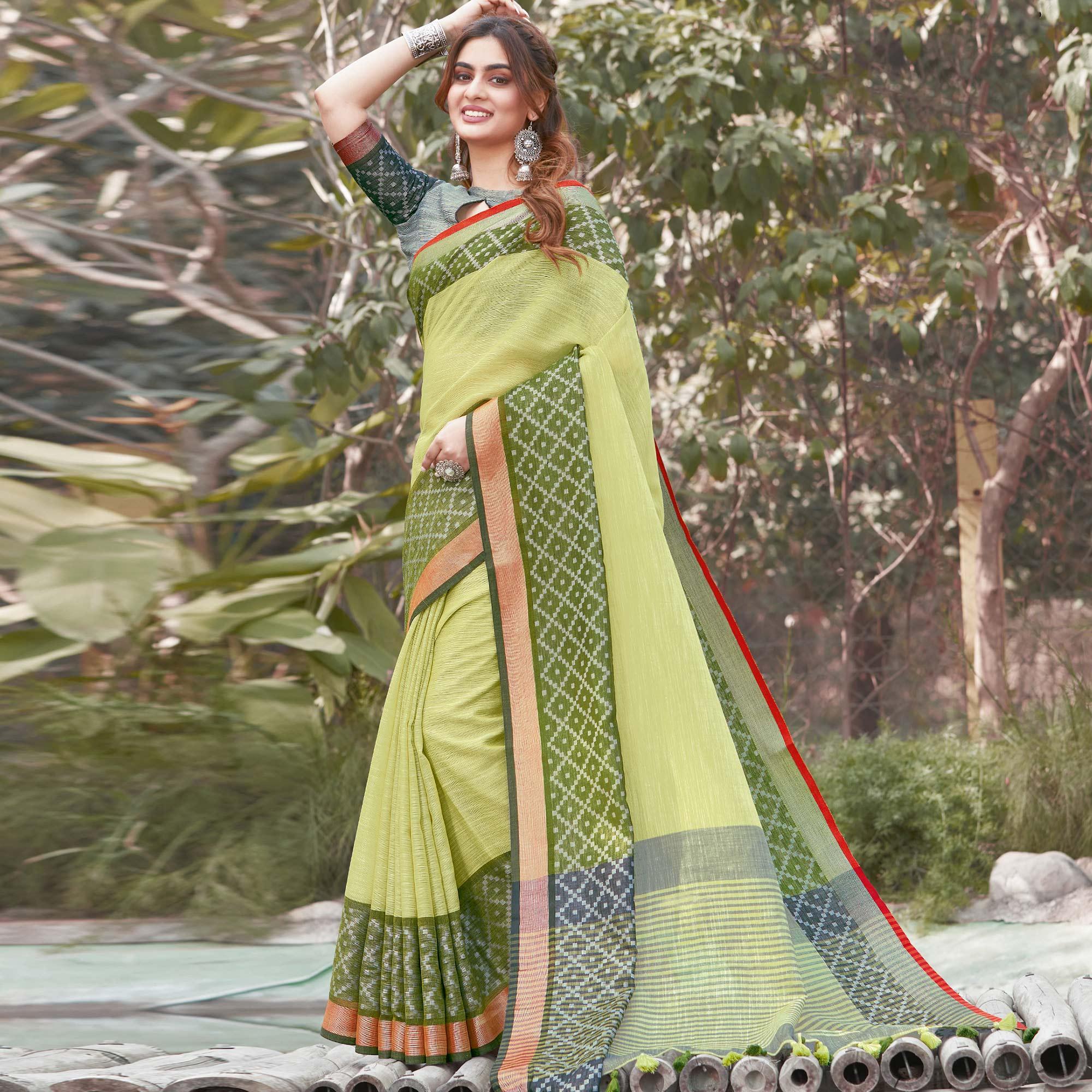 Graceful Green Colored Festive Wear Woven Linen Saree - Peachmode
