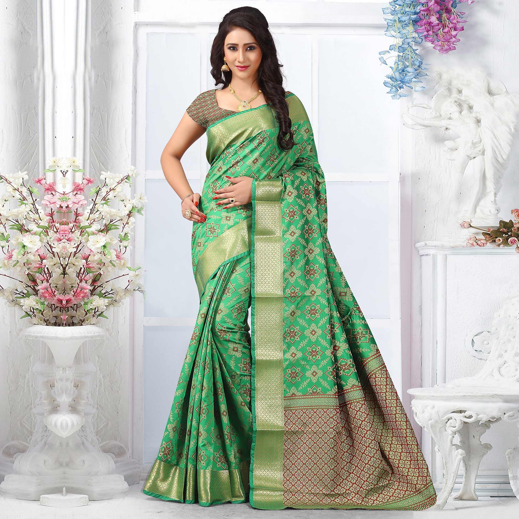 Graceful Green Colored Festive Wear Woven Silk Saree - Peachmode