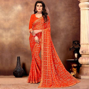 Graceful Orange Colored Festive Wear Bandhani Print With Gotta Border Heavy Georgette Saree - Peachmode