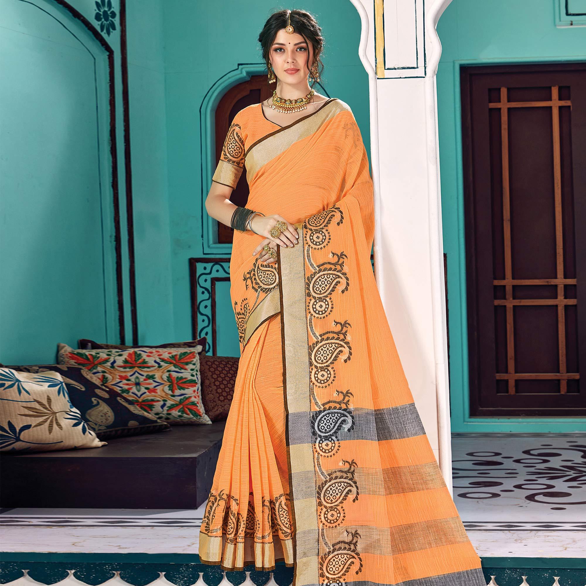 Graceful Orange Colored Partywear Printed Linen Cotton Saree - Peachmode