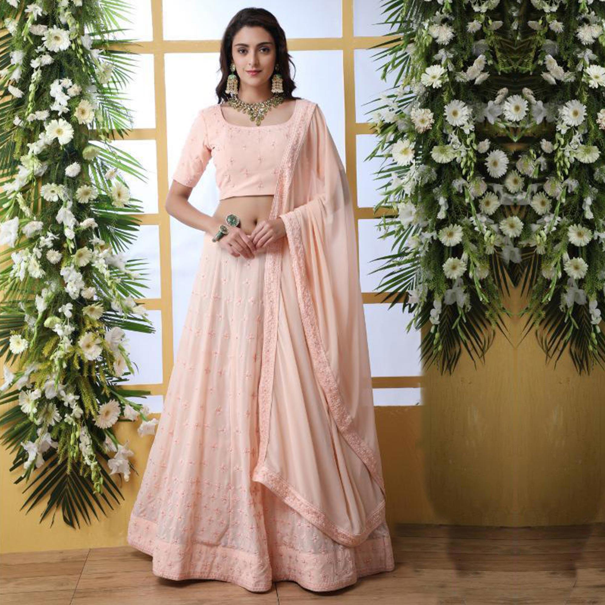 Graceful Peach Colored Party Wear Embrodiered Georgette Lehenga Choli - Peachmode