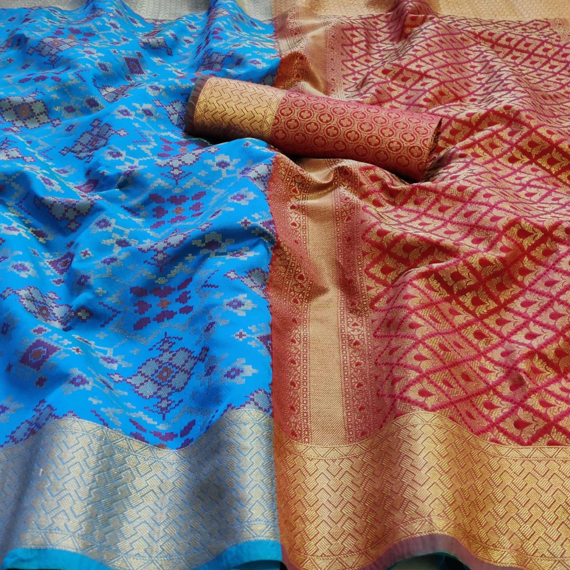 Graceful Sky Blue Colored Festive Wear Woven Patola Silk Saree - Peachmode