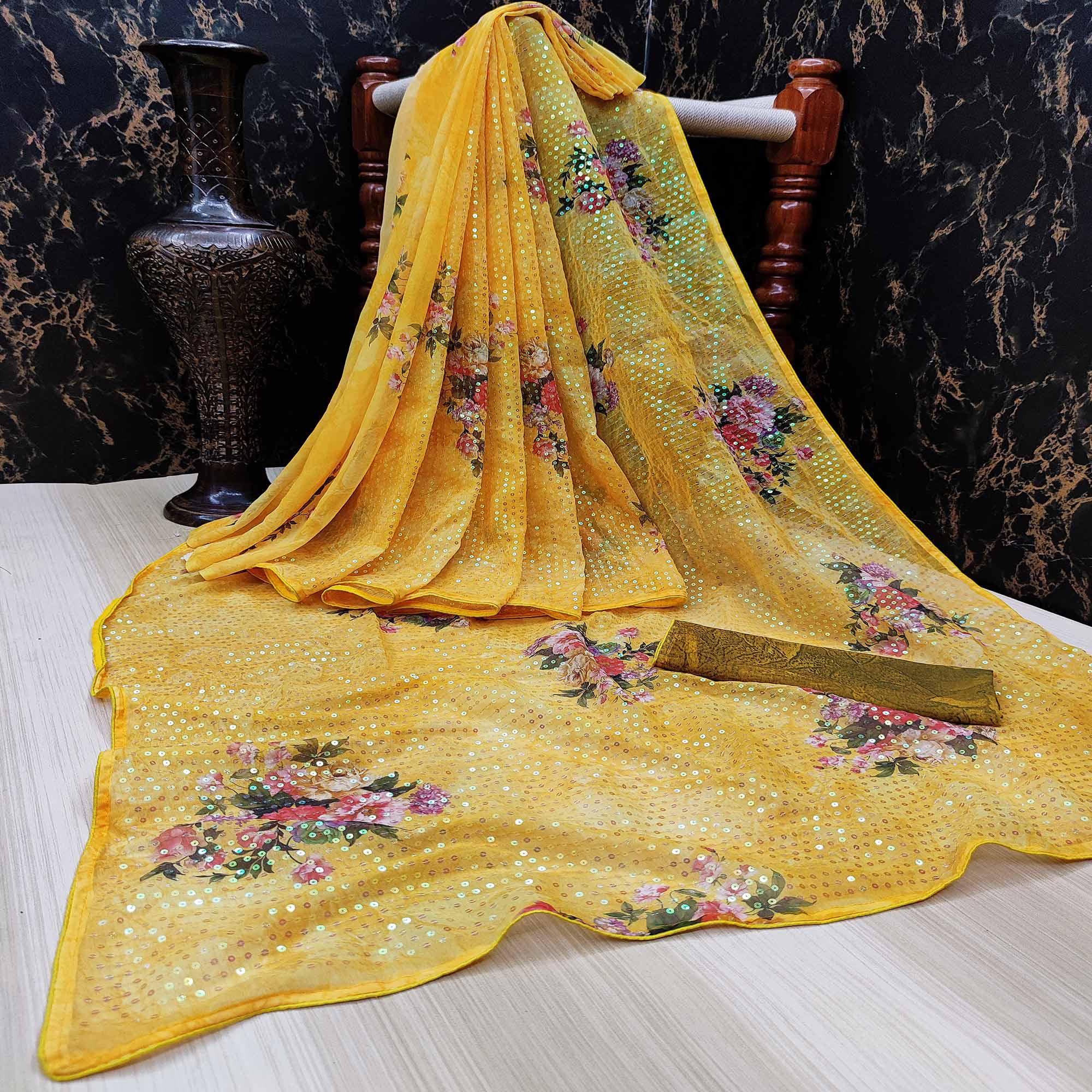 Graceful Yellow Colored Partywear Printed And Sequins Embroidered Georgette Saree - Peachmode