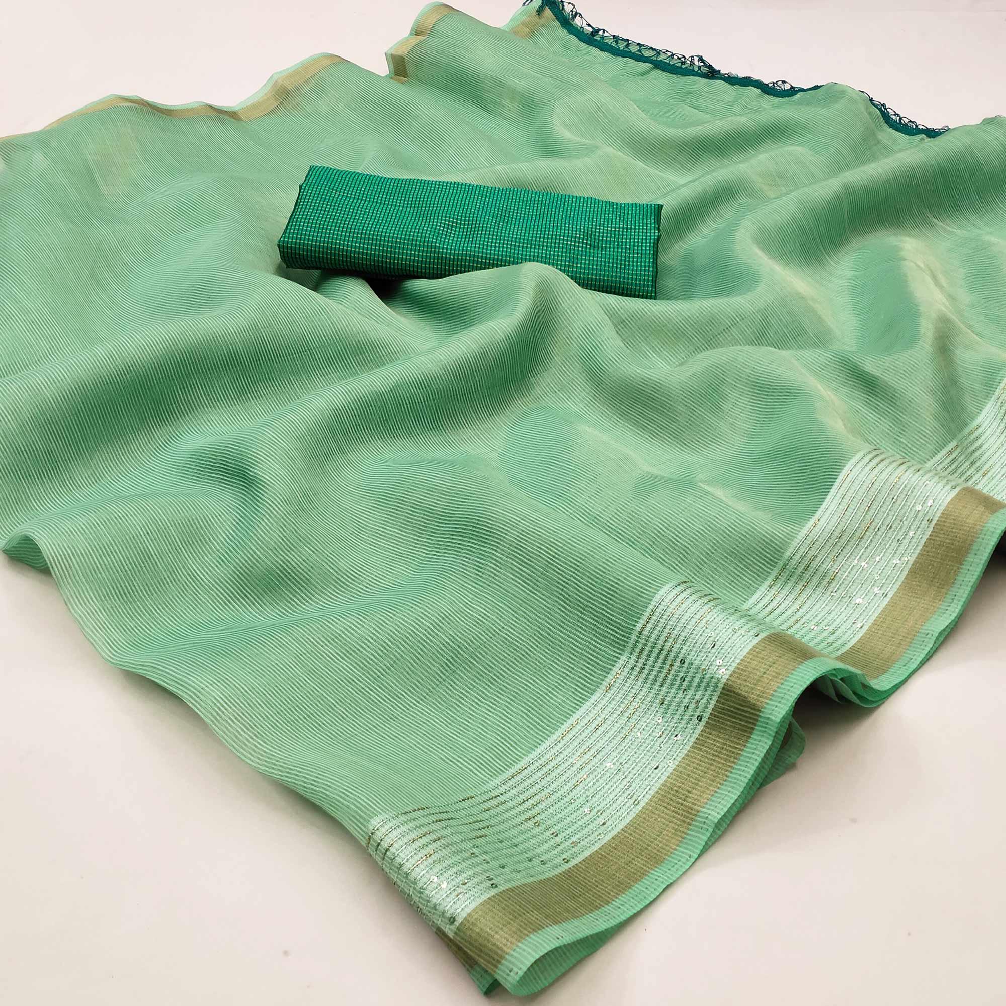 Green Casual Wear Embroidered Cotton Saree With Tassels - Peachmode