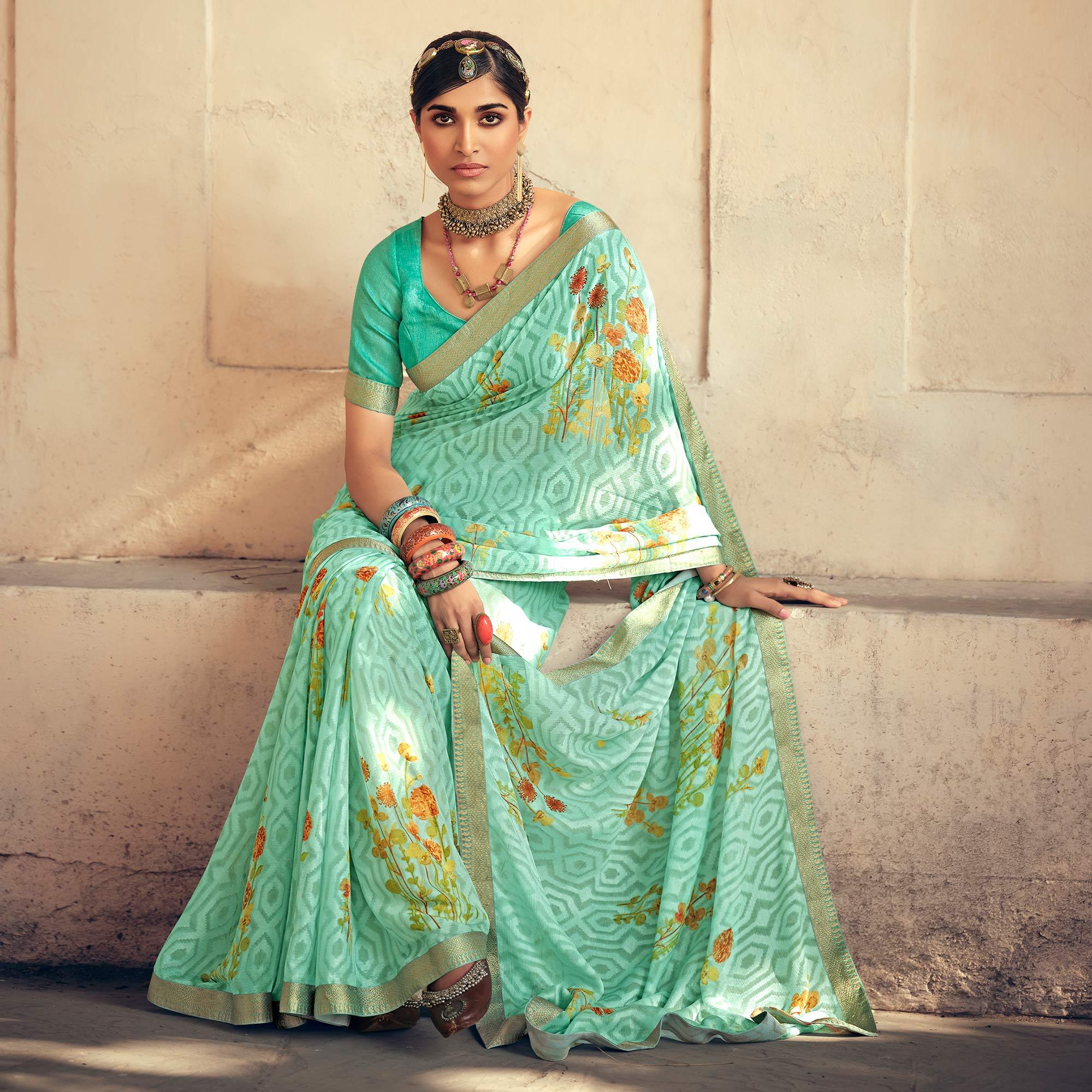 Green Casual Wear Floral Printed Chiffon Saree With Fancy Lace - Peachmode