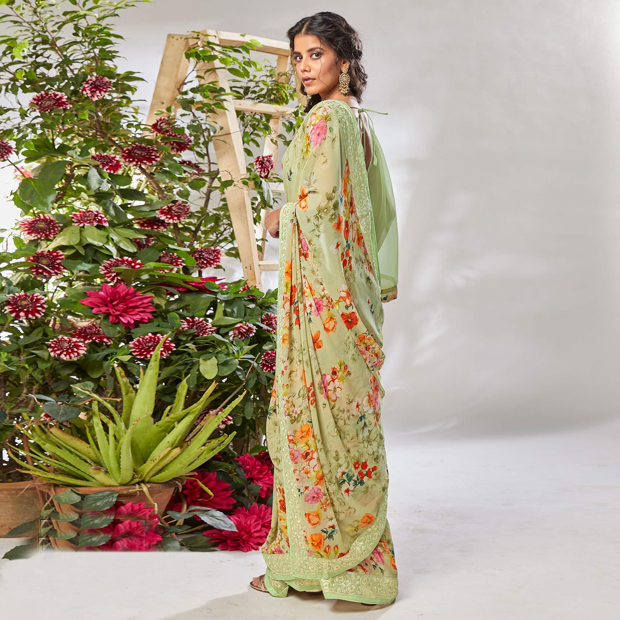 Green Casual Wear Floral Printed Georgette Saree - Peachmode