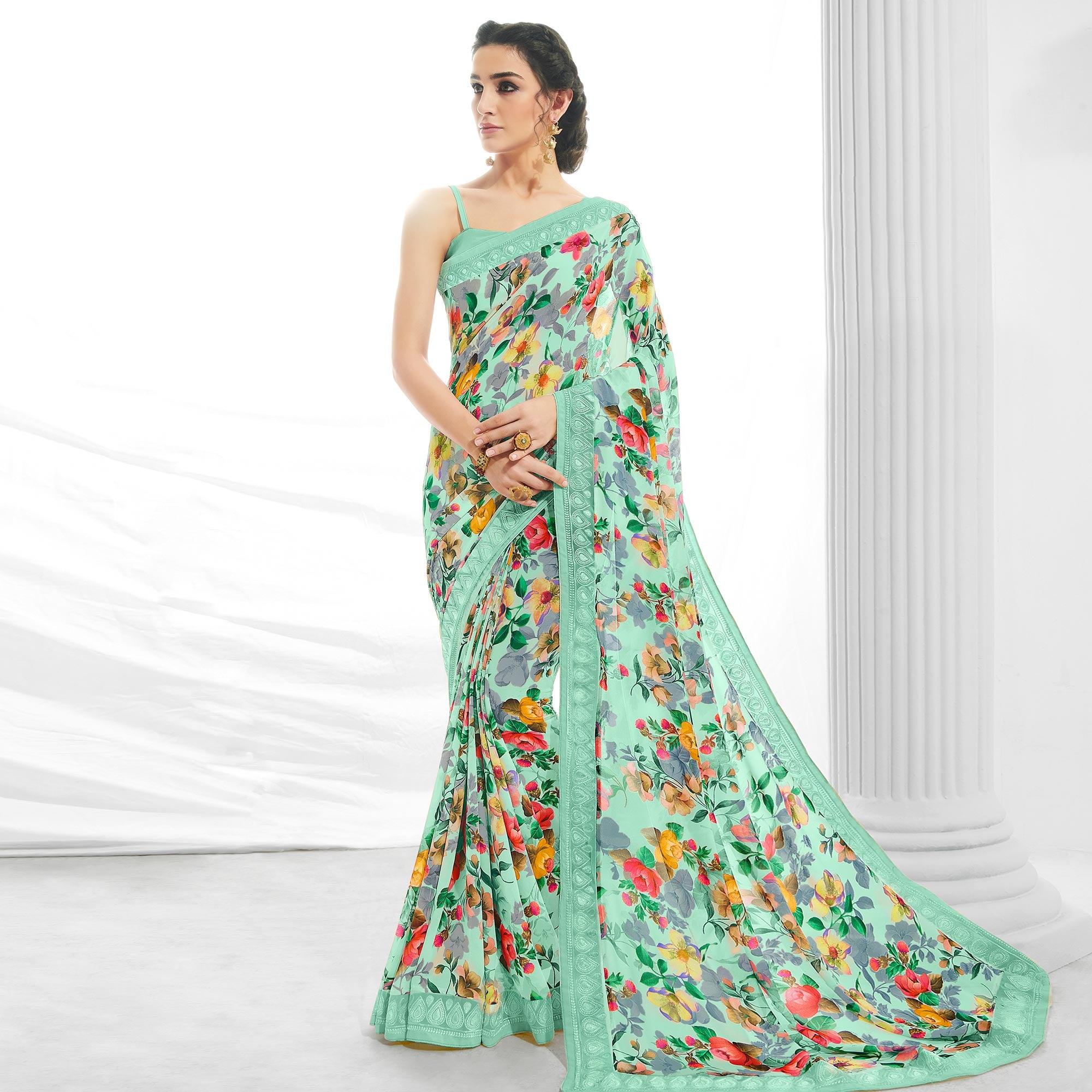 Green Casual Wear Floral Printed Georgette Saree - Peachmode