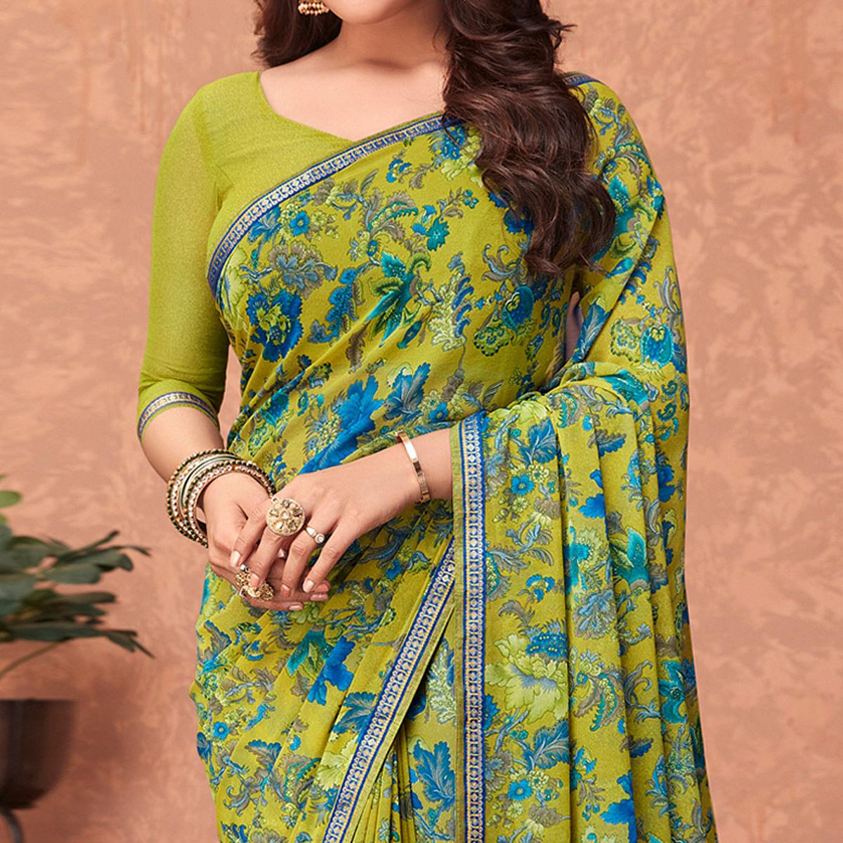 Green Casual Wear Floral Printed Georgette Saree - Peachmode