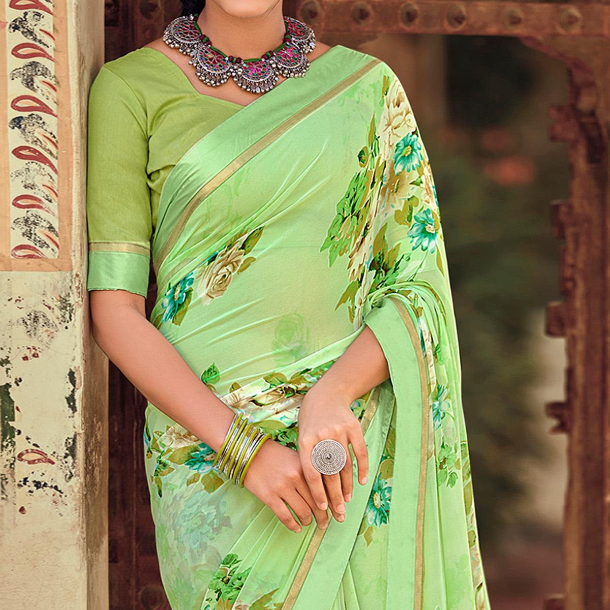 Green Casual Wear Floral Printed Georgette Saree - Peachmode
