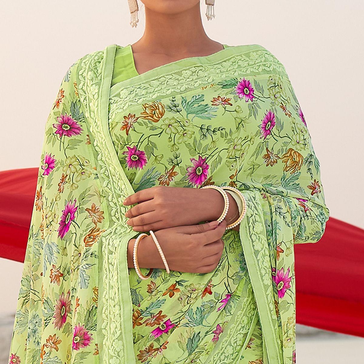 Green Casual Wear Floral Printed Georgette Saree - Peachmode