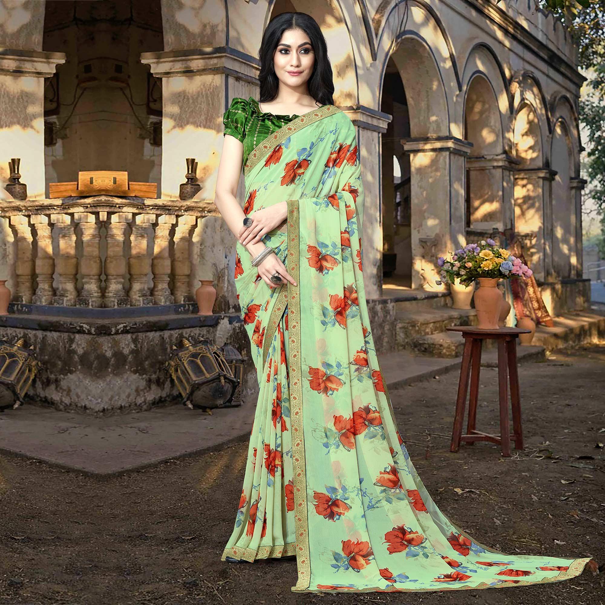 Green Casual Wear Floral Printed Georgette Saree With Lace Border - Peachmode