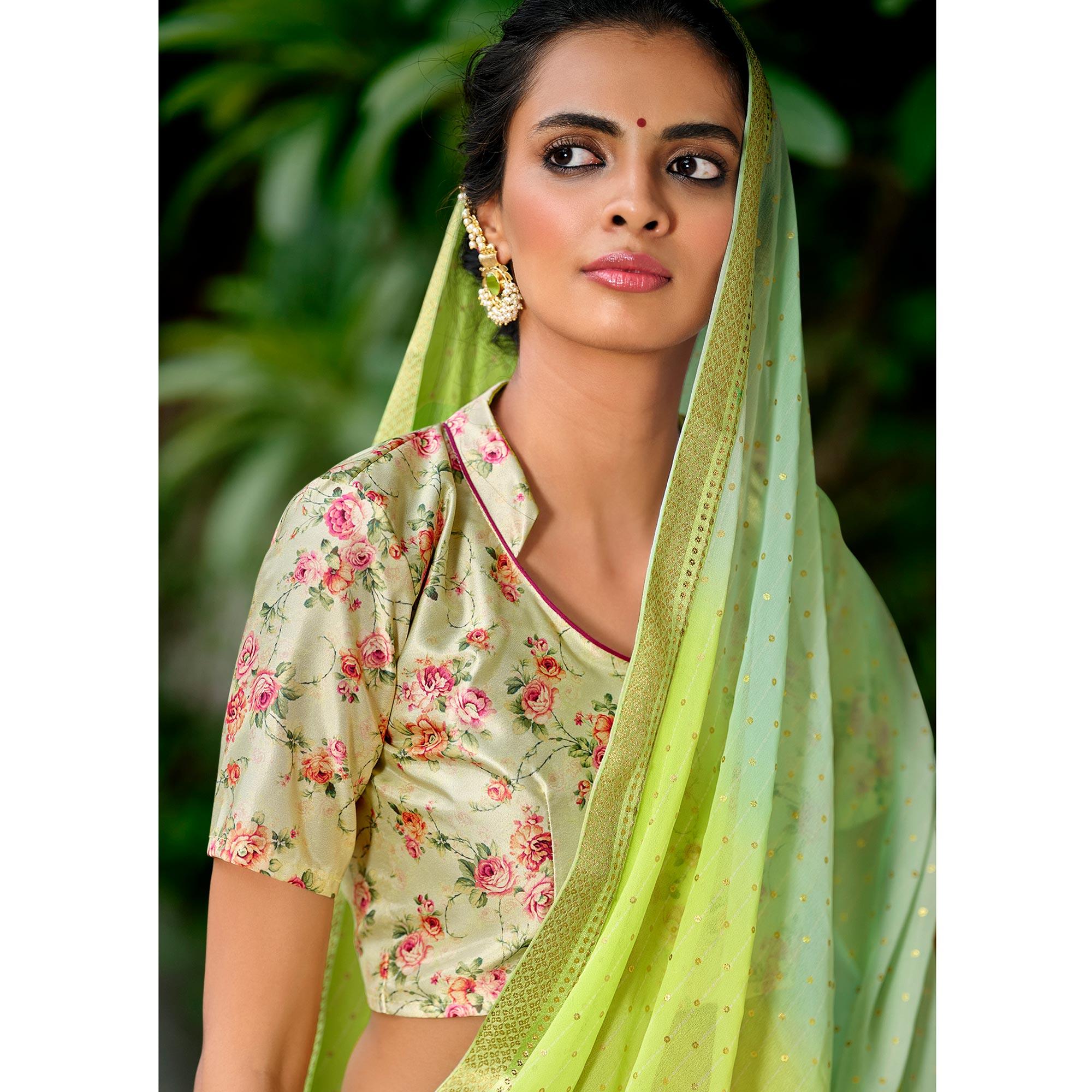 Green Casual Wear Foil Printed Georgette Saree - Peachmode
