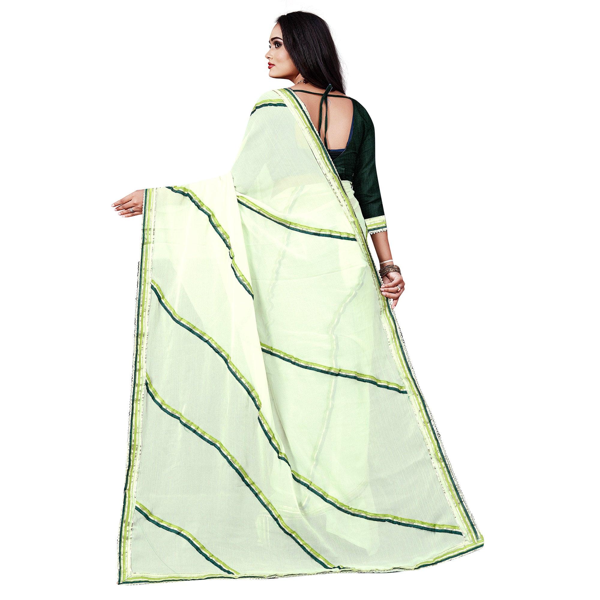 Green Casual Wear Lace Work Chiffon Saree - Peachmode