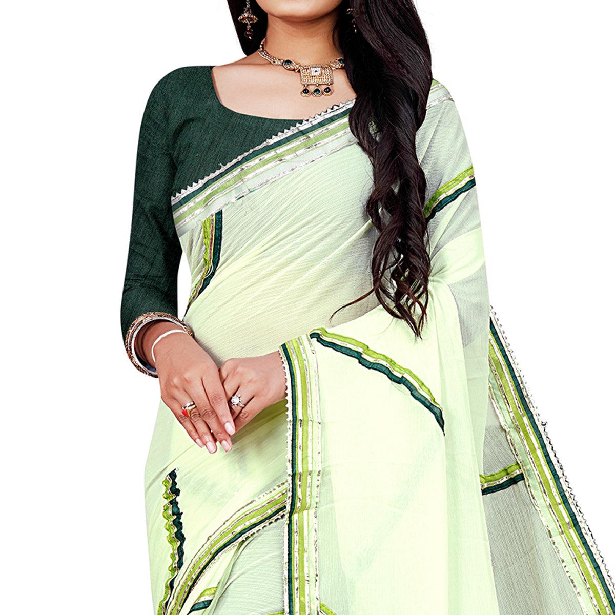 Green Casual Wear Lace Work Chiffon Saree - Peachmode