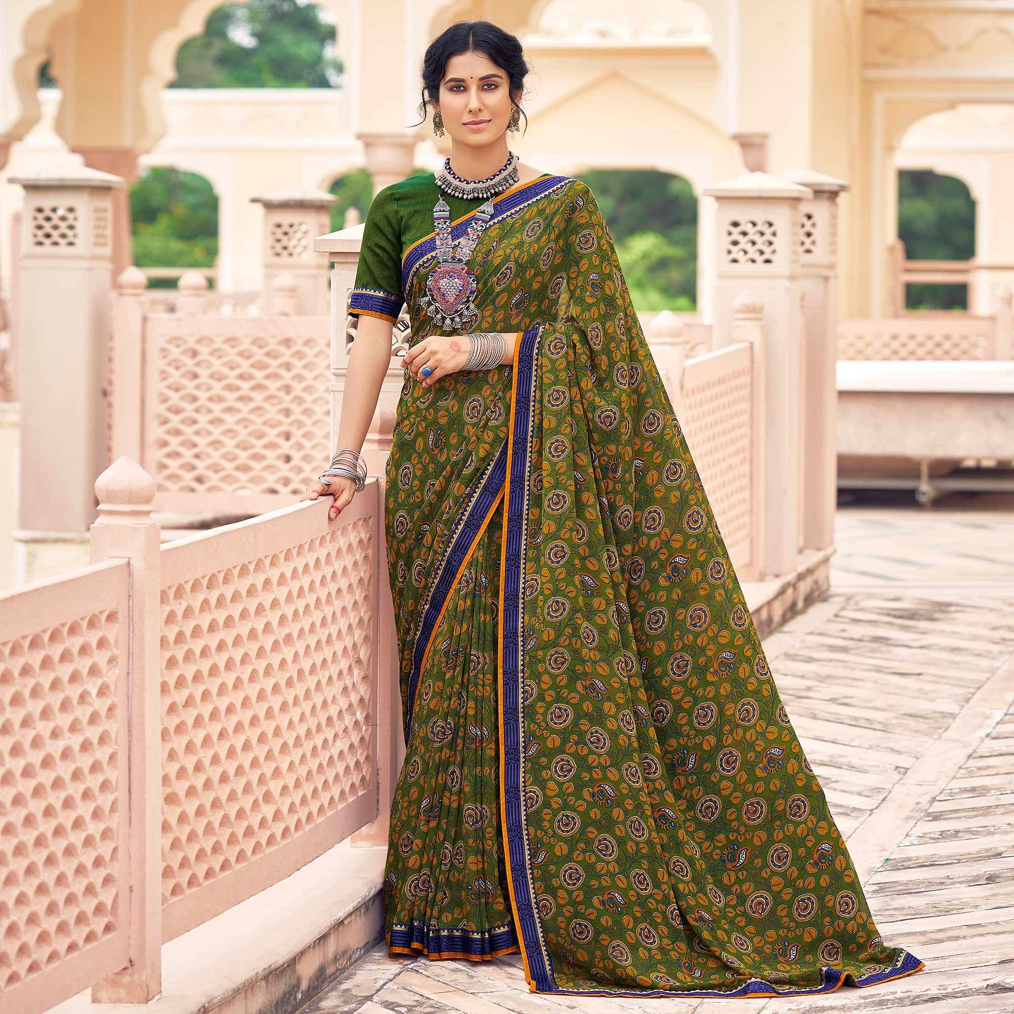 Green Casual Wear Printed Weightless Georgette Saree - Peachmode