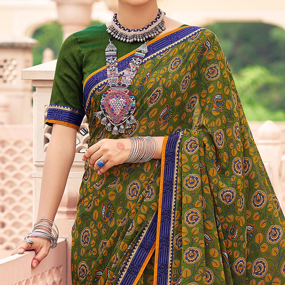 Green Casual Wear Printed Weightless Georgette Saree - Peachmode