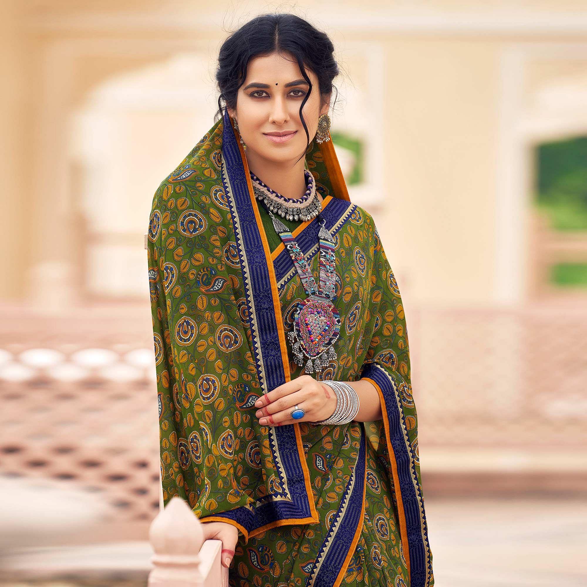 Green Casual Wear Printed Weightless Georgette Saree - Peachmode