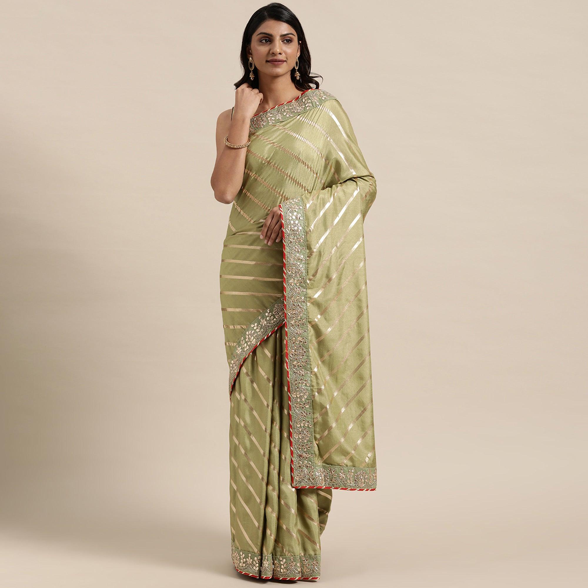Green Casual Wear Stripes Printed Georgette Saree - Peachmode