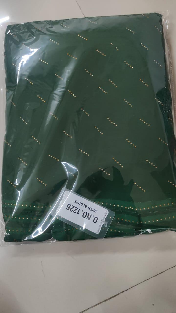 Green Embellished Georgette Saree - Peachmode