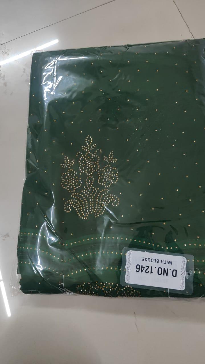Green Embellished Georgette Saree - Peachmode
