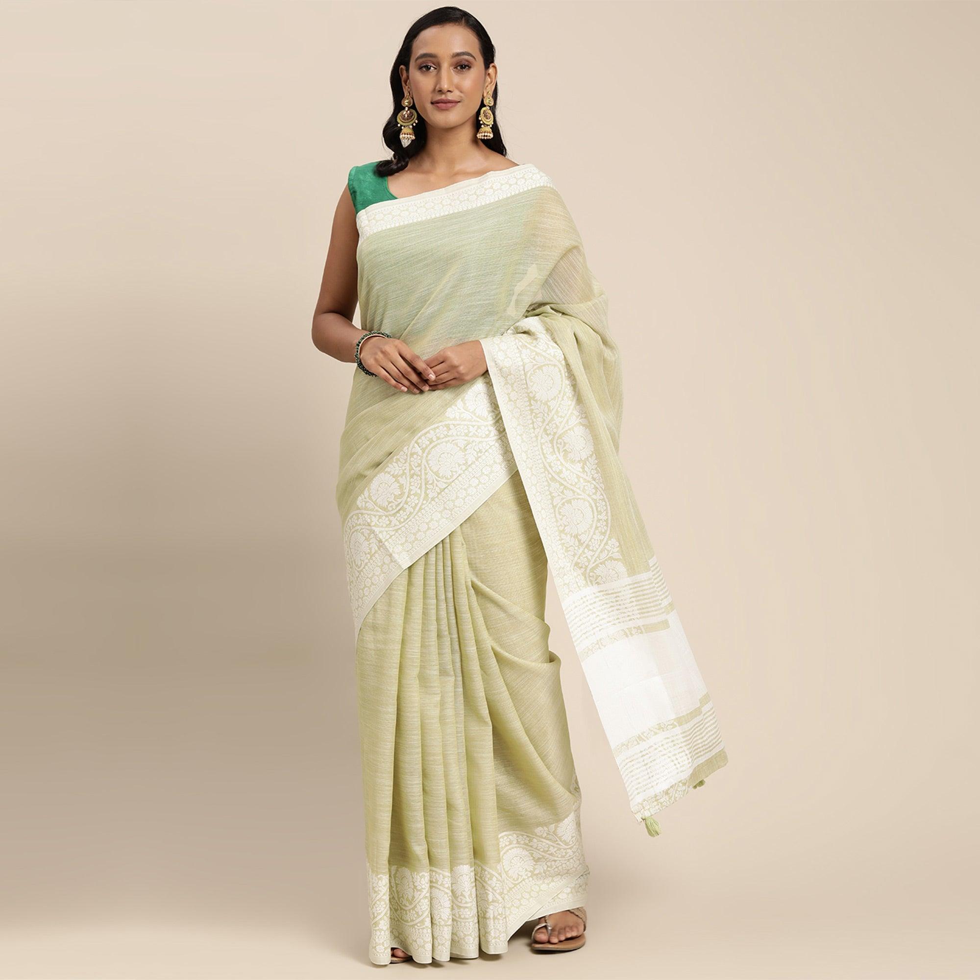 Green Embroidered Linen Saree with Tassels - Peachmode