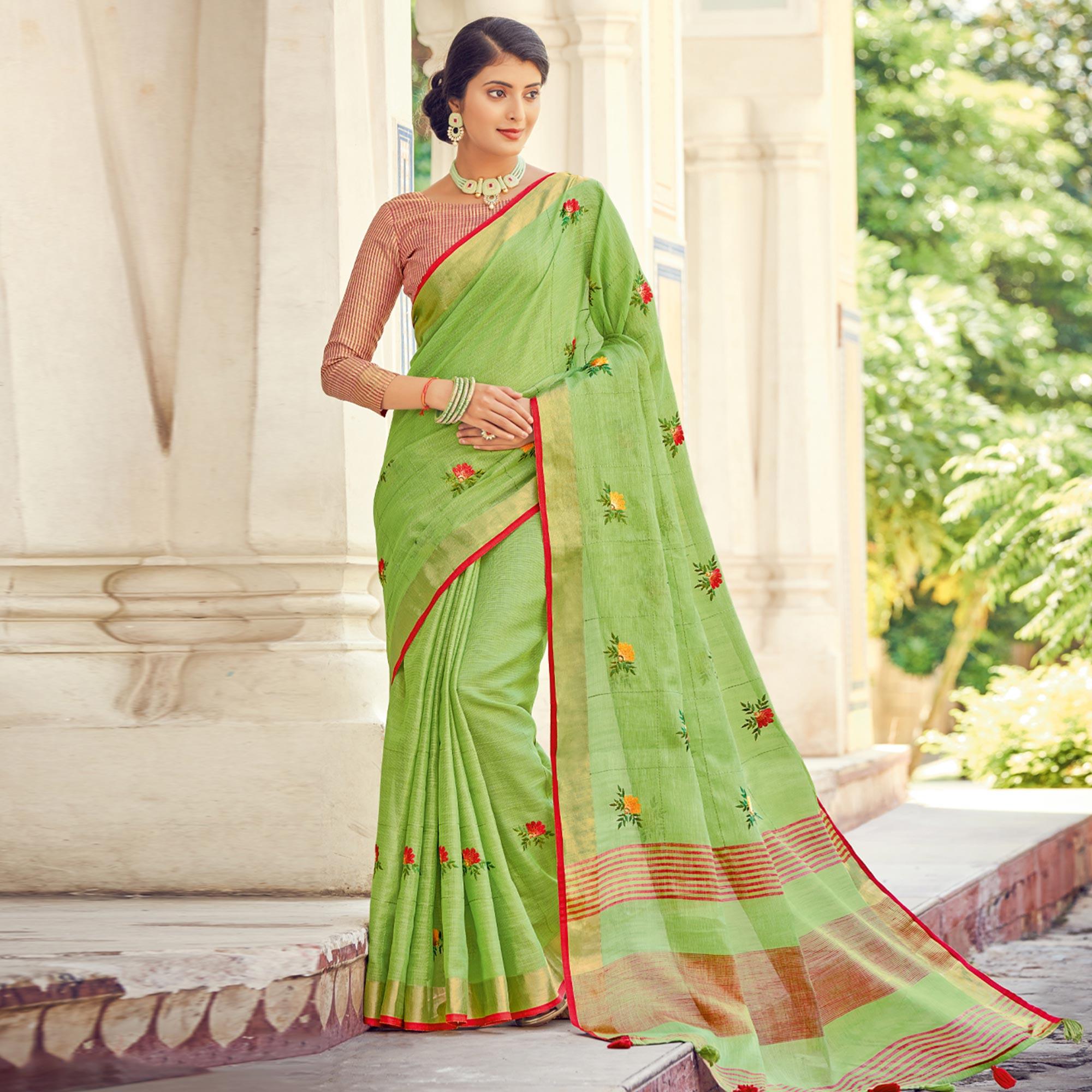Green Embroidered Linen Saree With Tassels - Peachmode