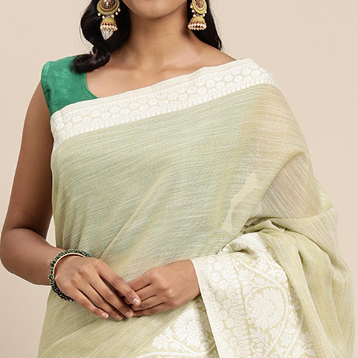 Green Embroidered Linen Saree with Tassels - Peachmode