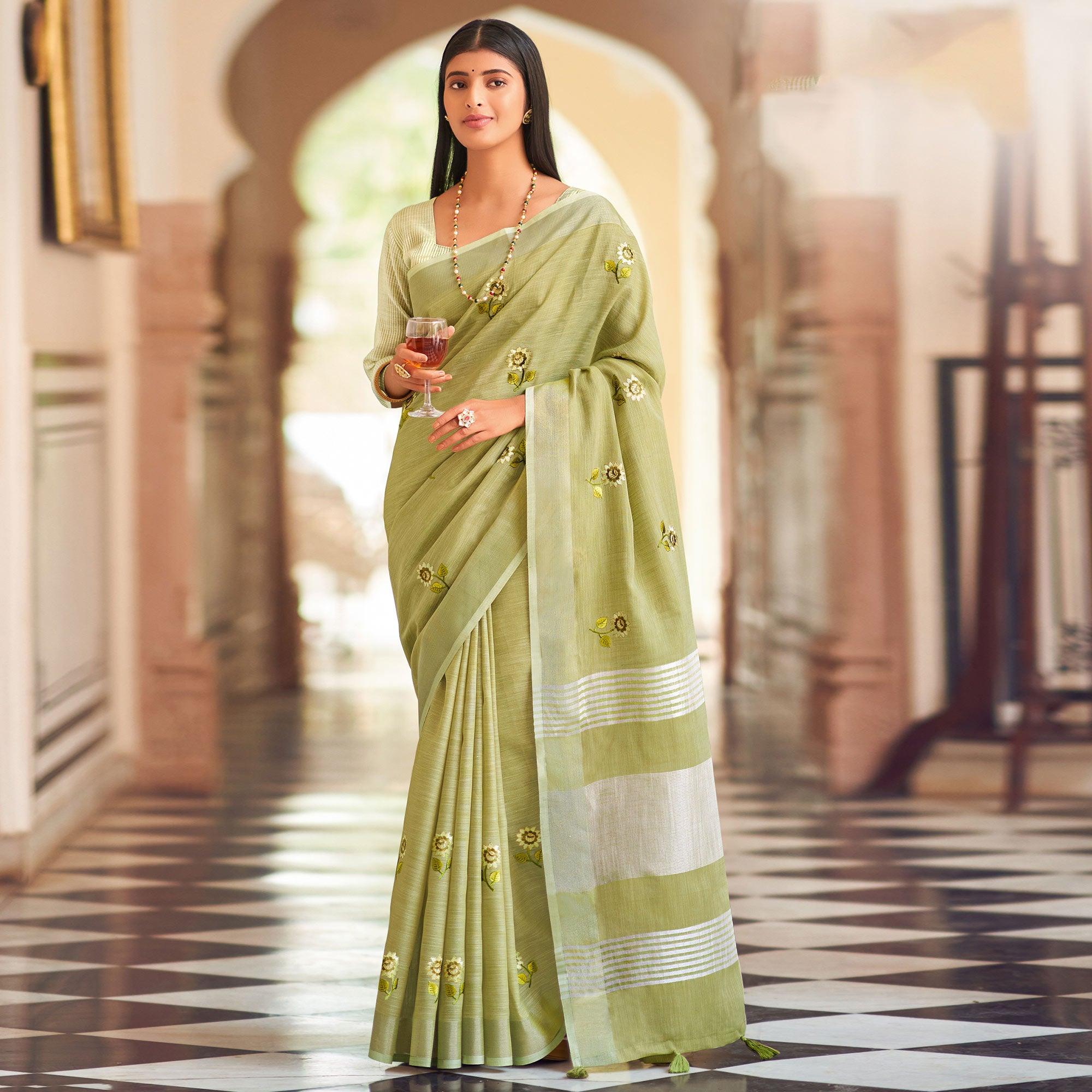 Green Festive Wear Embroidered Linen Saree - Peachmode