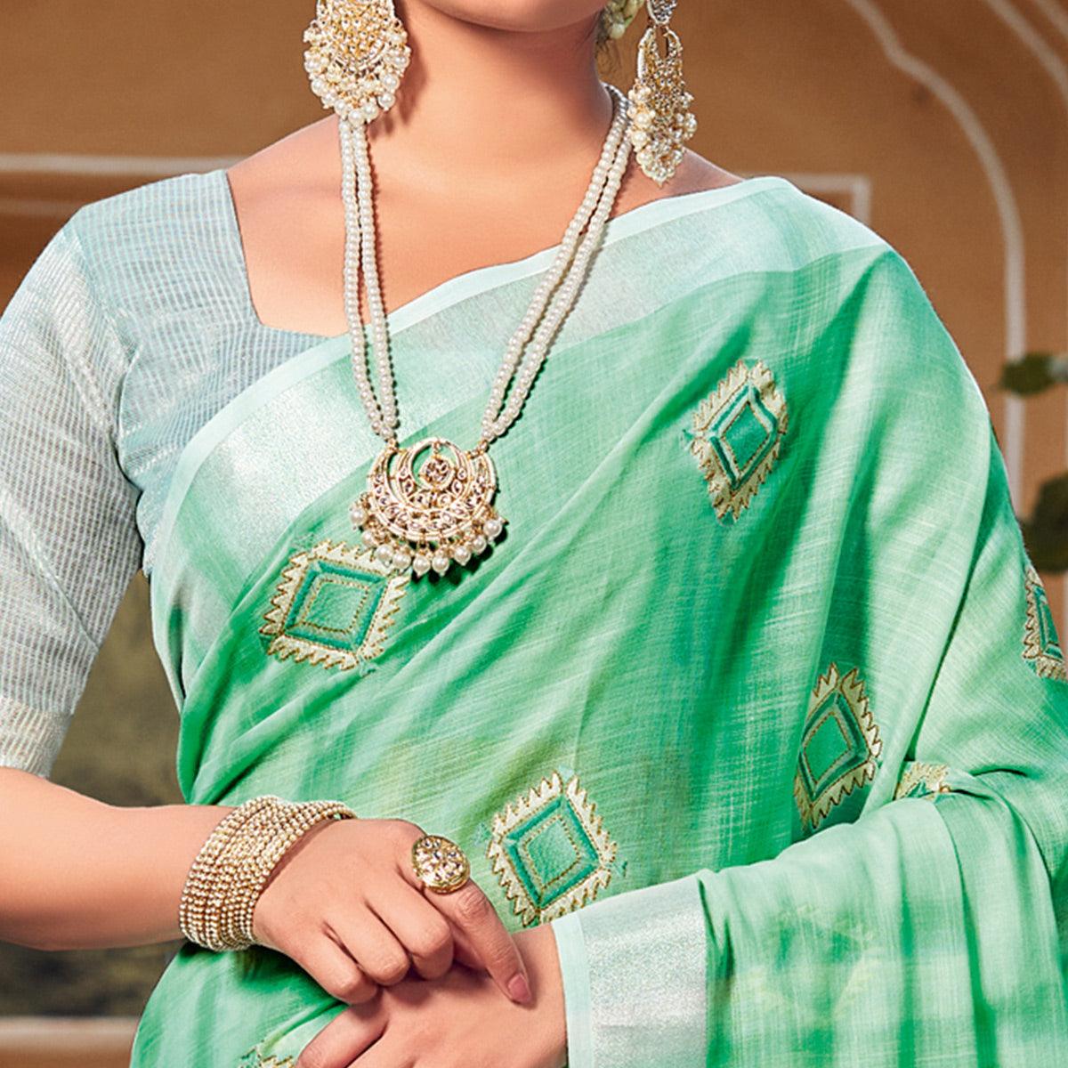 Green Festive Wear Embroidered Linen Saree - Peachmode