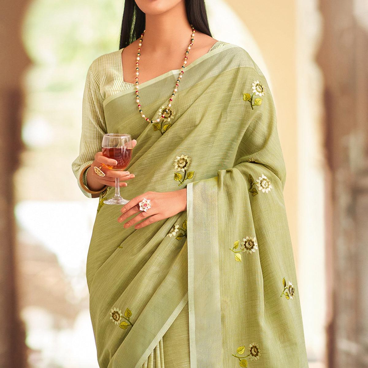 Green Festive Wear Embroidered Linen Saree - Peachmode
