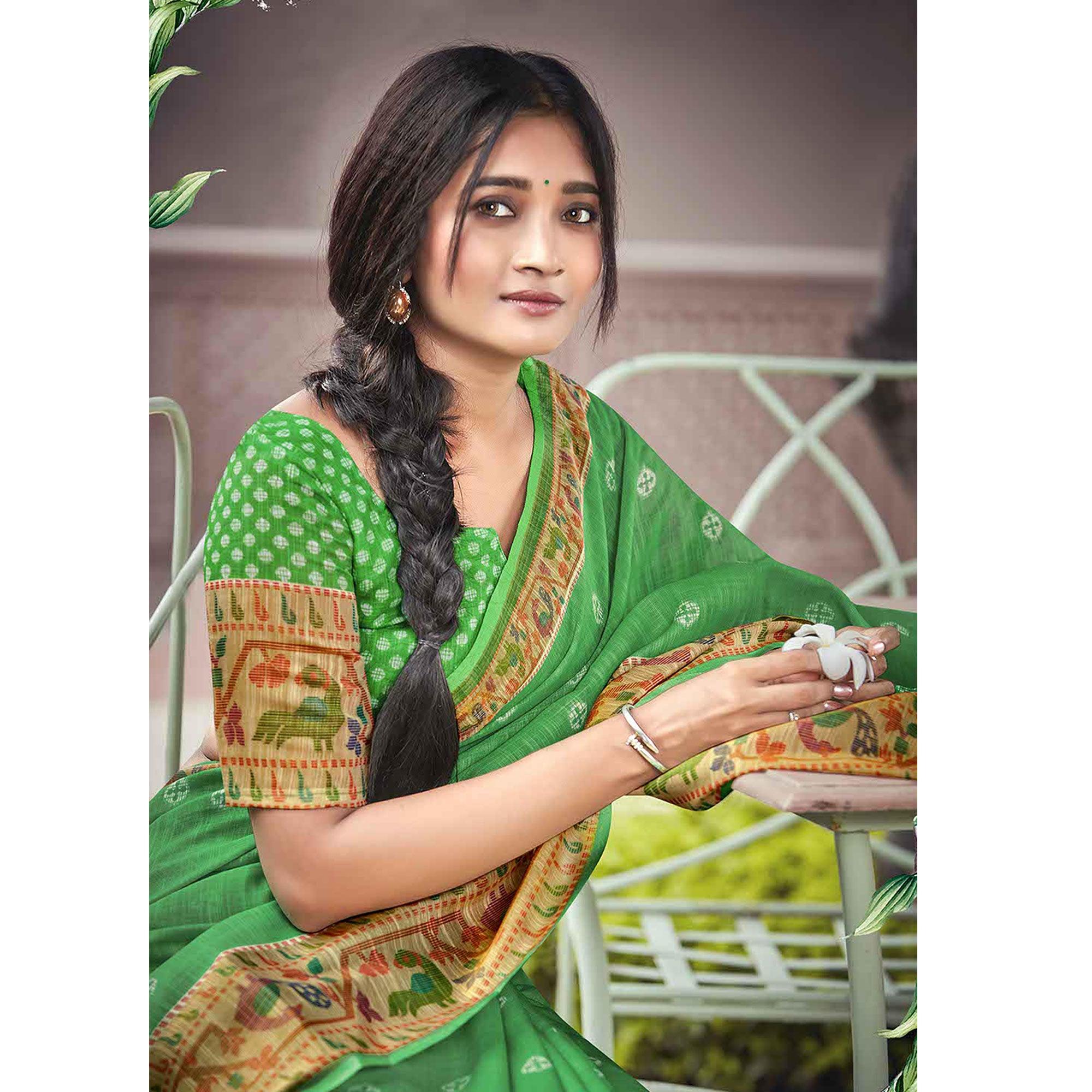 Green Festive Wear Printed Linen Saree With Border - Peachmode