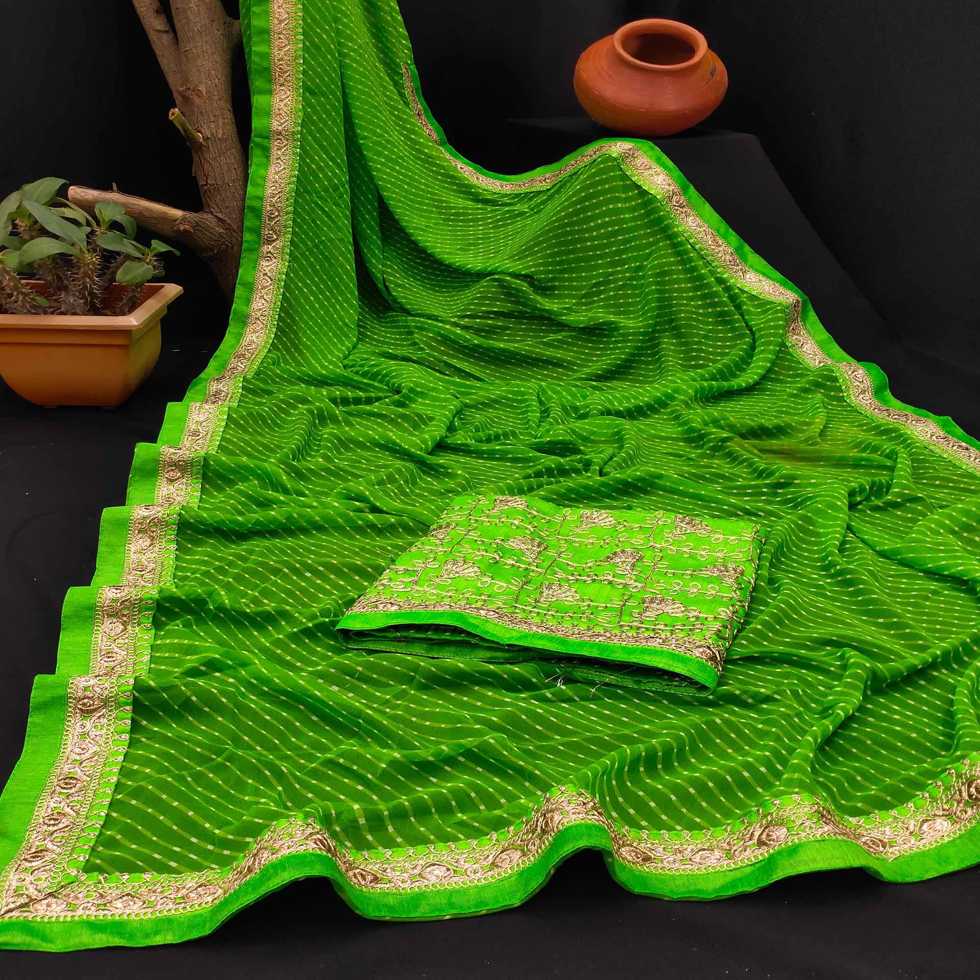 Green Festive Wear Printed With Lace Border Georgette Saree - Peachmode