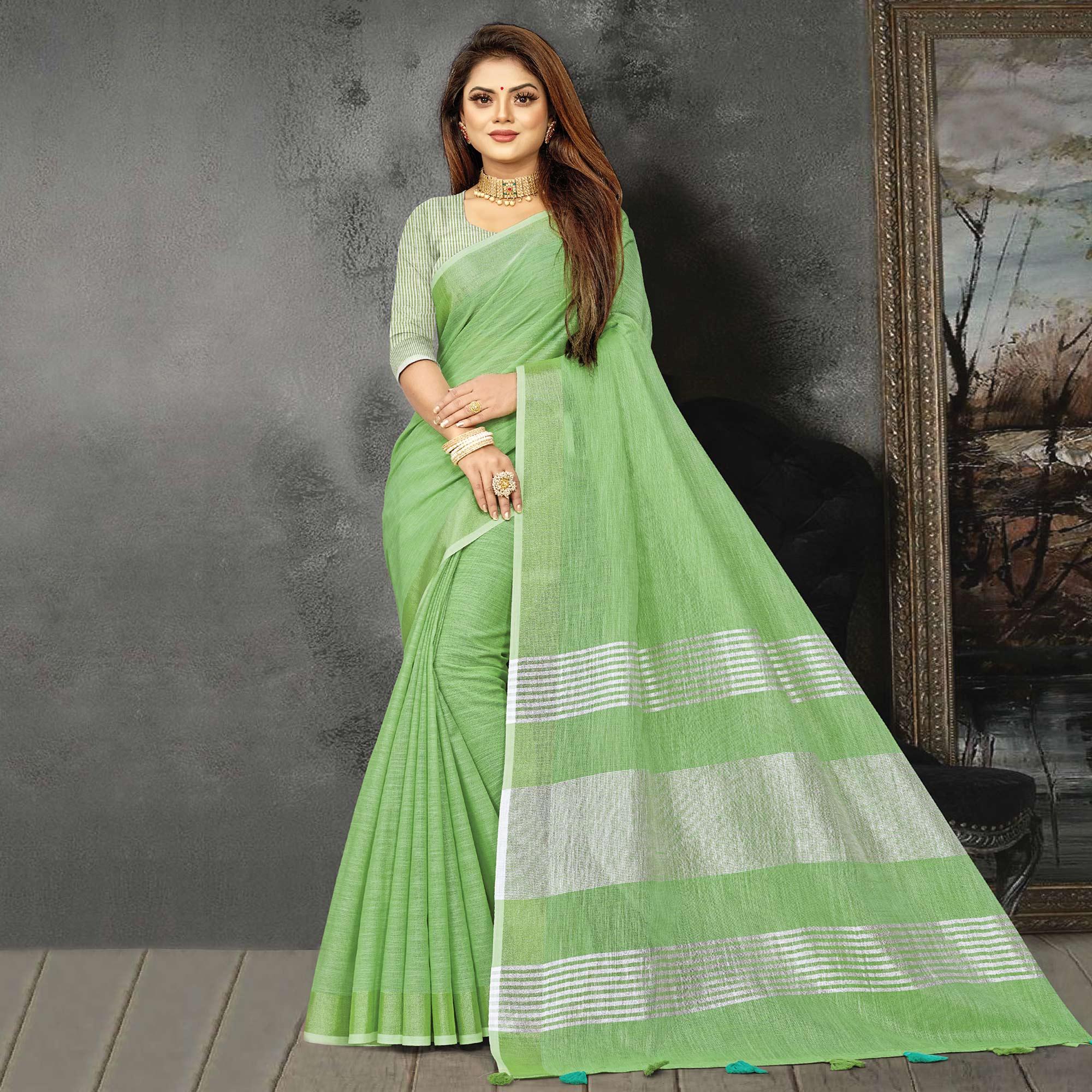 Green Festive Wear Solid Linen Saree - Peachmode