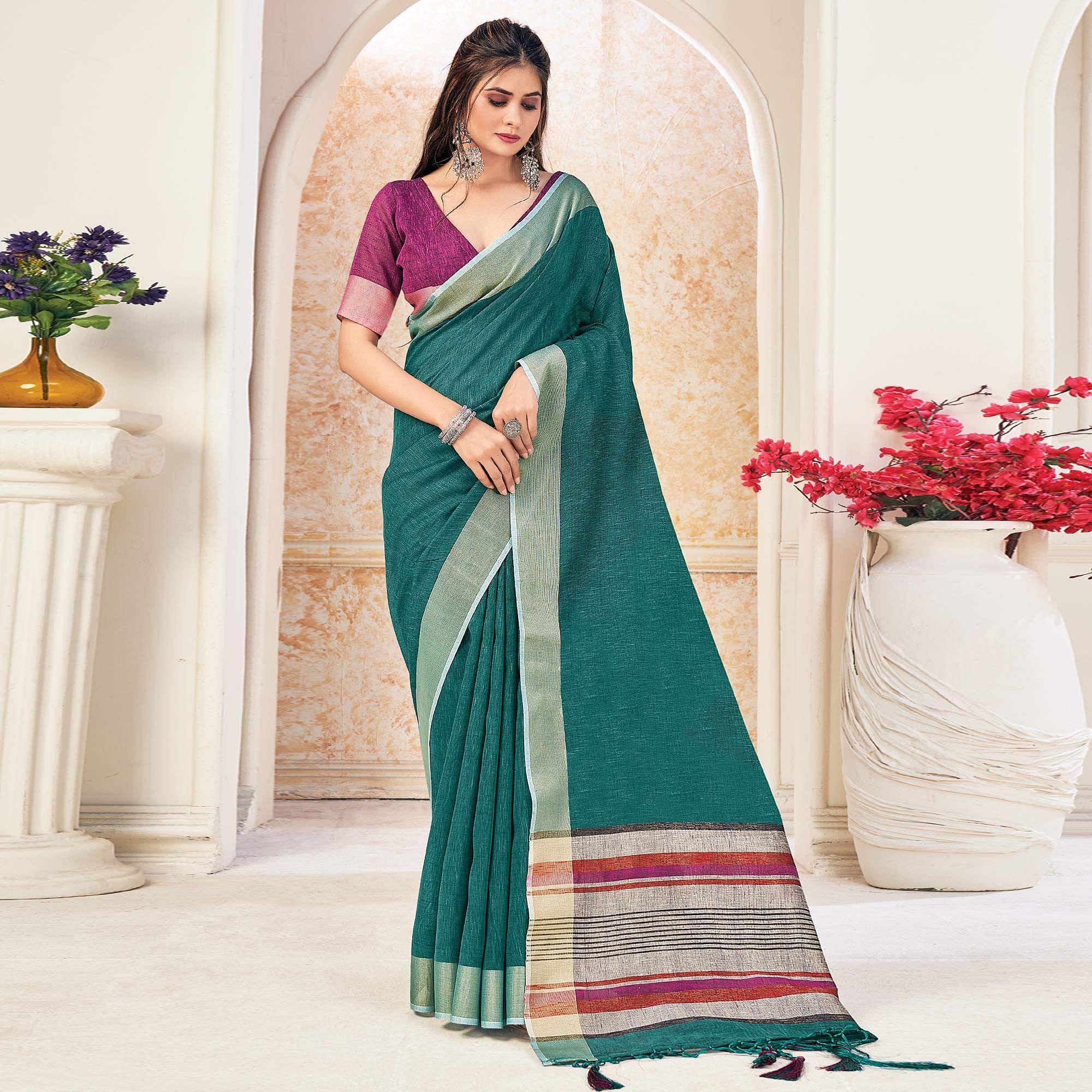 Green Festive Wear Solid Linen Saree - Peachmode