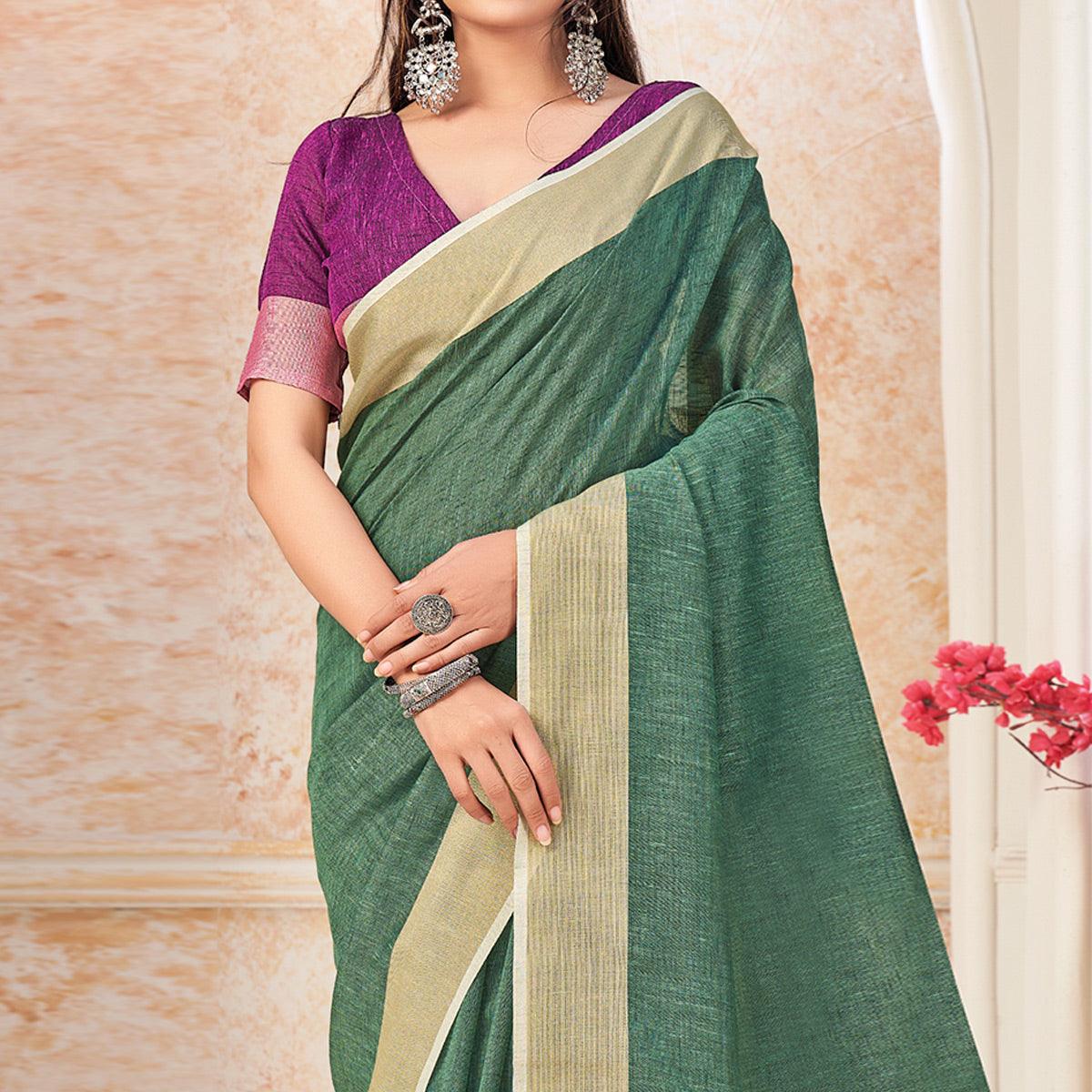Green Festive Wear Solid Linen Saree - Peachmode