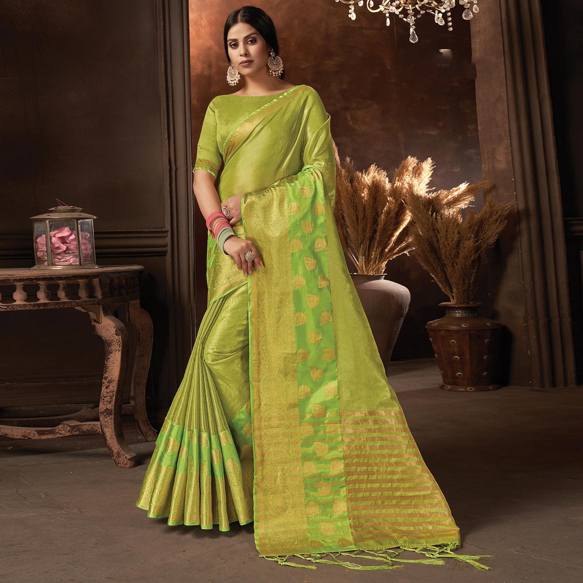 Green Festive Wear Solid Organza Saree With Tassels - Peachmode