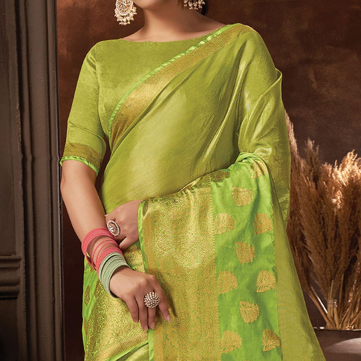 Green Festive Wear Solid Organza Saree With Tassels - Peachmode