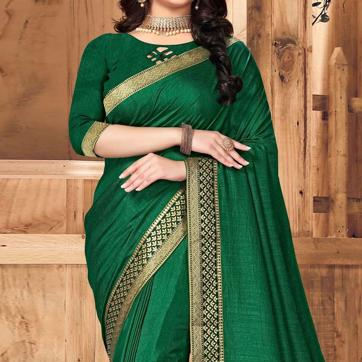 Green Festive Wear Solid Vichitra Silk Saree - Peachmode