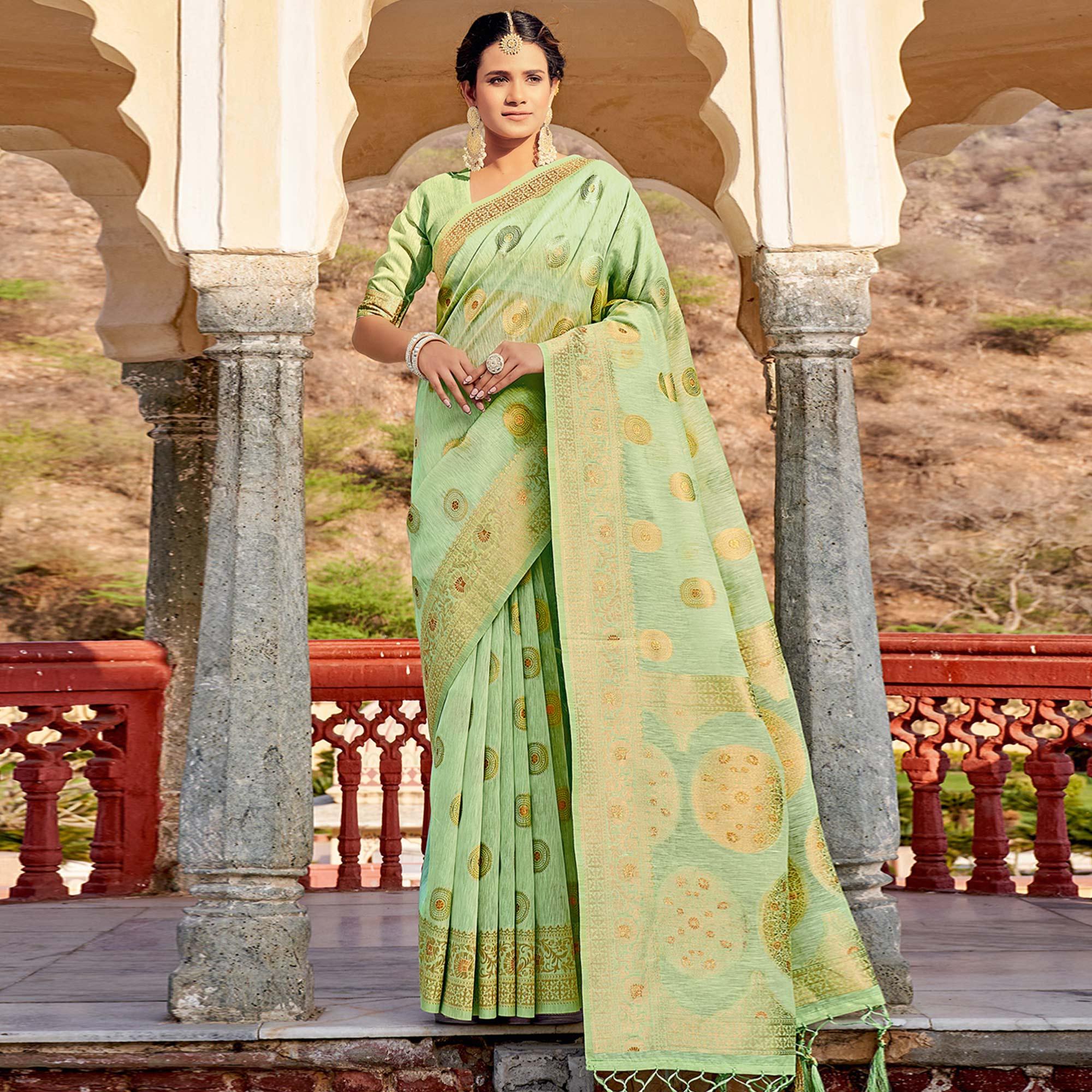 Green Festive Wear Weaving Work Linen Saree With Tassels - Peachmode