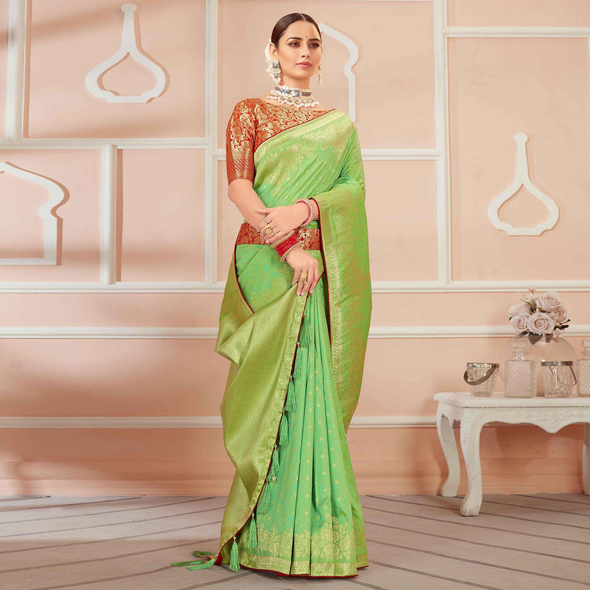 Green Festive Wear Woven Banarasi Silk Saree With Tassels - Peachmode