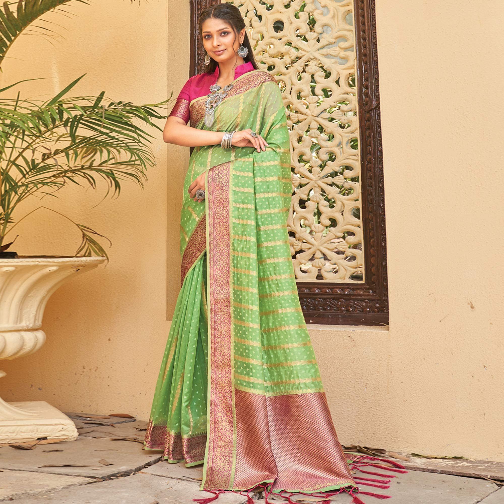 Green Festive Wear Woven Organza Saree With Tassels. - Peachmode