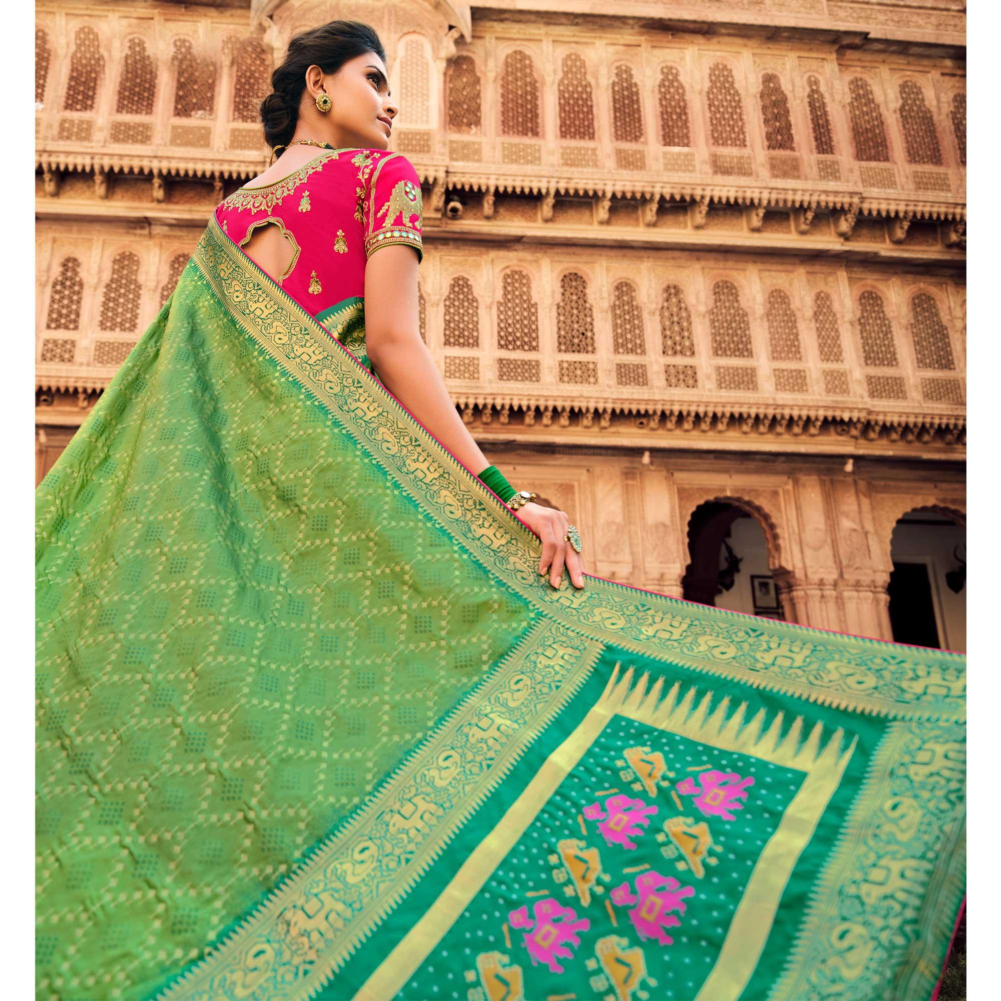 Green Festive Wear Woven Silk Saree - Peachmode