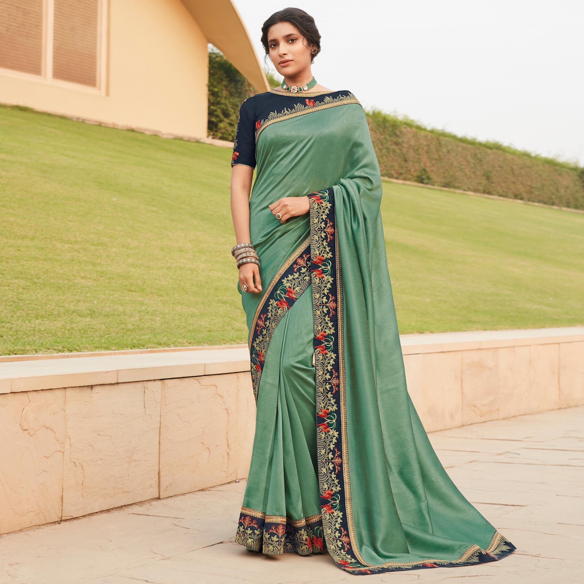 Green Festive Wear Woven Silk Saree With Border - Peachmode